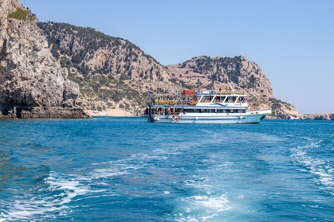 East Coast Bay to Bay Full-Day Boat Trip with Transfers - Stop 1: Anthony Quinn Bay (Vaghies) for a calm first swim