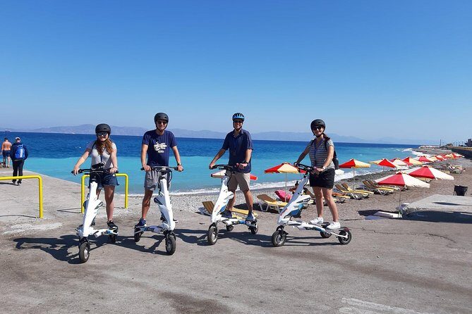 Explore the new town and the medieval town of Rhodes on scooters - 3 hours - Mandraki Harbour to Windmills: Deer, Lighthouse Views, and Knights’ Walls