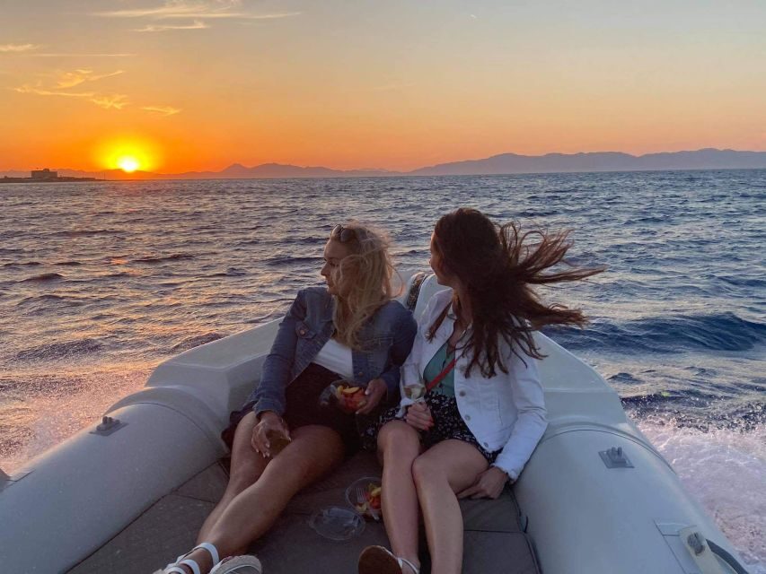 Faliraki: Evening RIB Cruise with Champagne and Sunset Views - Rhodes Town and the harbor: the moment you look back and go wow