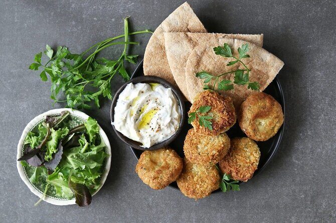 Food & Wine Tour: 11- Course Lunch, Cooking Class, Wine Tasting - Wine tasting that goes beyond samples