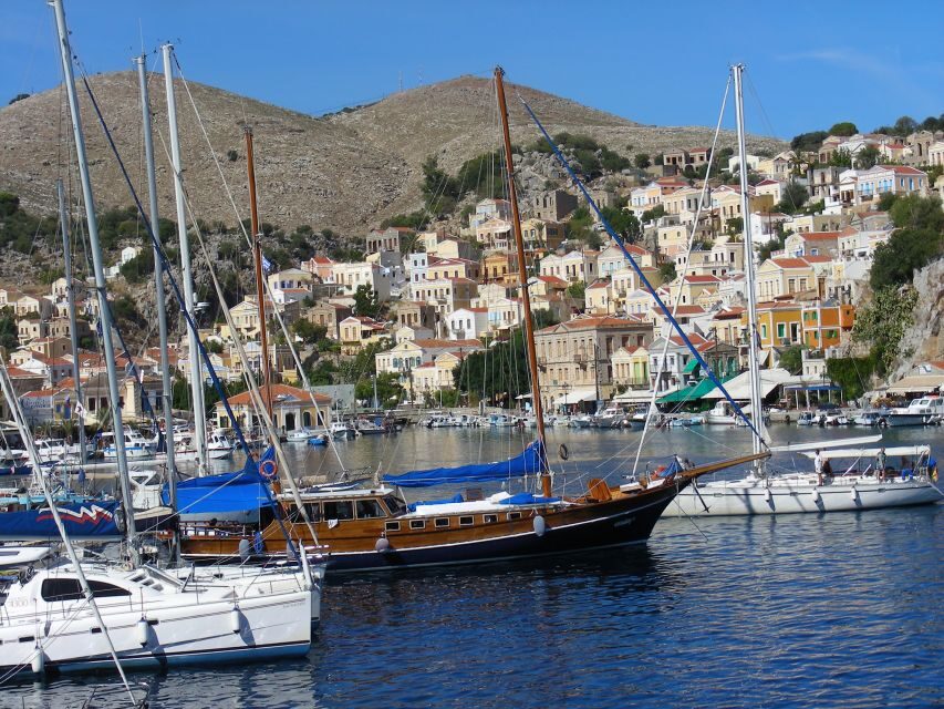 From Rhodes: Boat Trip to Symi Island with Hotel Transfer - Symi town strolling: pastel streets plus sponge-coast details