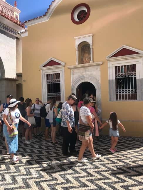 From Rhodes: Symi Island and Panormitis Monastery Day Trip - Symi town for 3.5 hours: colorful houses, sponge-harvesting shops, and backstreets