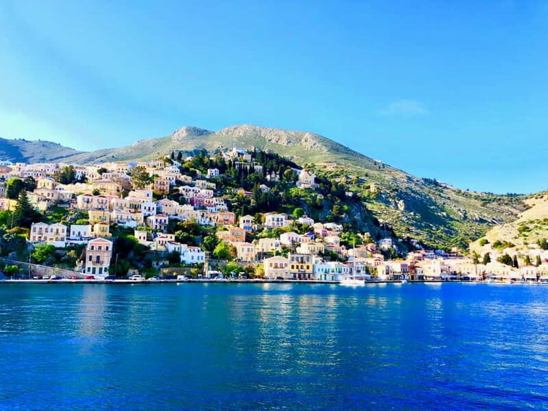 From Rhodes: Symi Island Day Trip by Boat with Hotel Pickup - Exploring Symi village: pastel streets, sponge shops, and lunch on your terms