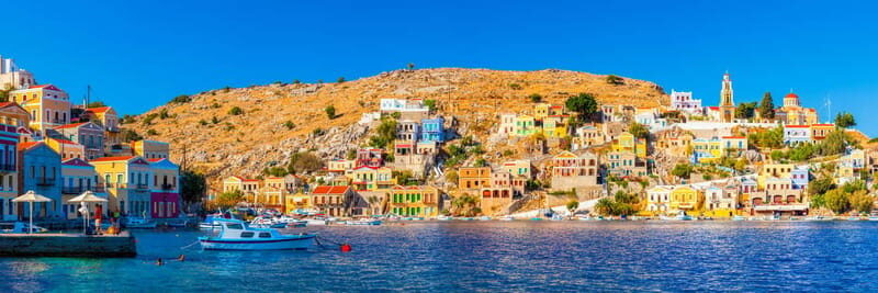 From Rhodes: Symi Island Day Trip by Boat with Hotel Pickup - The 10.5-hour rhythm: pickup, cruising, and how the day is paced