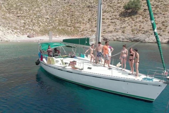 Greek Shores Snorkel and Sailing Day Trip with Lunch - Mandraki Harbour Return: Built-In Wind-Down Time