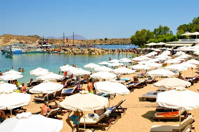 Lindos Day Cruise from Rhodes Town with Swimming stops and Hotel Transfers - Boat comfort, food access, and dealing with big-group energy