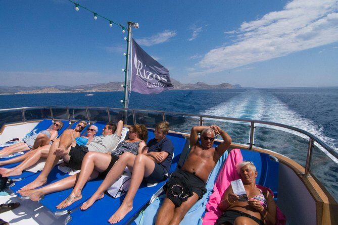 Lindos Full Day Boat Tour with Swimming - Comfort on a big boat: sunbeds, AC, and how to enjoy the crowd