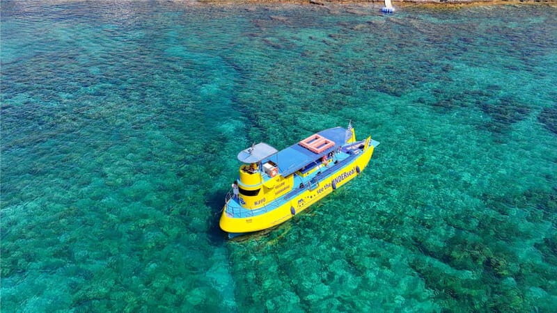 Lindos: Submarine Cruise with Swimming Stop at Navarone Bay - Your 2-Hour Timeline: Lindos, Landmark Passes, Then Swim