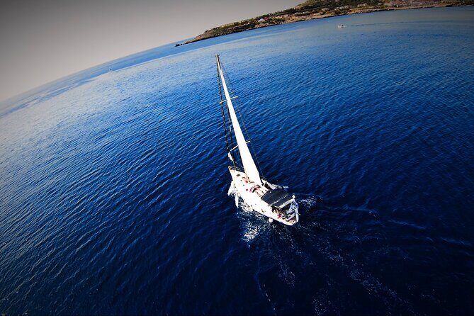 Private Sailing Tour in Rhodes - Stop 3: Traganou Beach for caves, quick jumps, and turquoise water