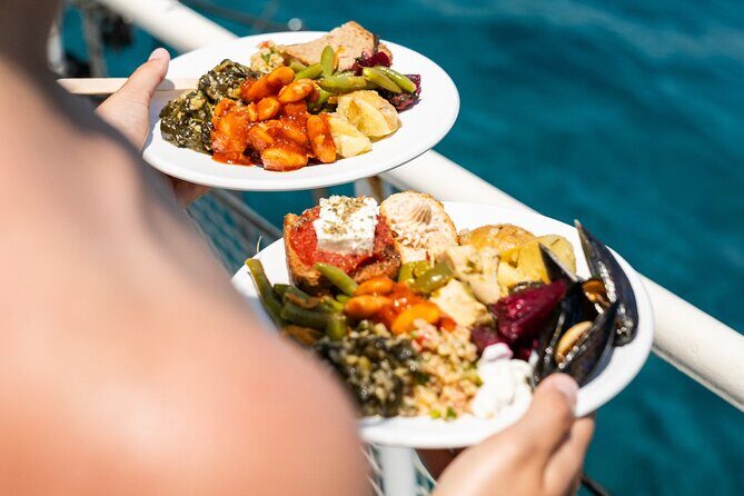 Rhodes Bay to Bay Swim Cruise-Greek Buffet w/wine included - Ladiko Bay on the Pass-By: Oil Trade and Shipwreck Clay