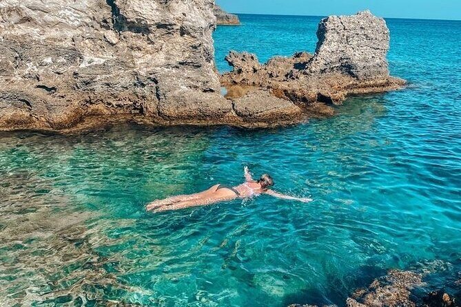 Rhodes Bay to Bay Swim Cruise-Greek Buffet w/wine included - Anthony Quinn Bay Snorkeling: A Deep Cove With Thousands of Fish