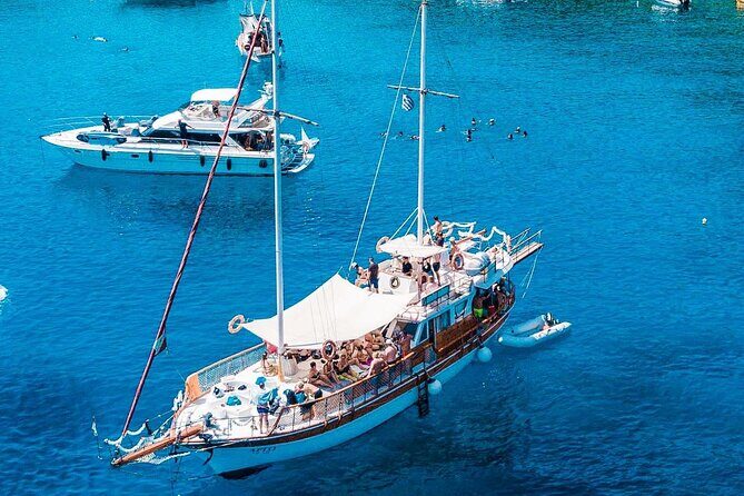 Rhodes Day Cruise (with lunch & unlimited drinks) 5,5 Hours - Stop 2: Anthony Quinn Bay on a wooden boat ride