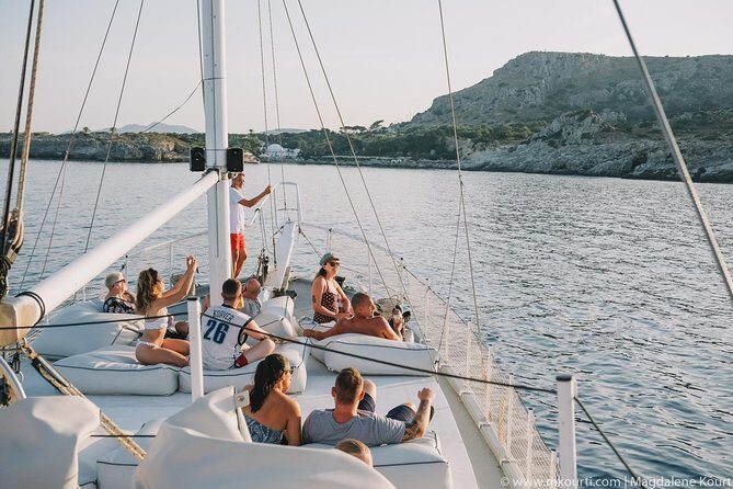 Rhodes Exclusive Sunset tour Cocktail Open bar Gourmet Live Music - Live music on the return cruise: how the sound affects the vibe