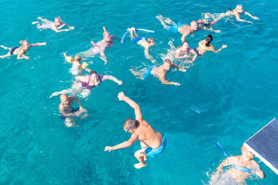 Rhodes: Full Day East Coast Bay to Bay Boat Trip with Lunch - Afandou Beach and the Cave: Rocky Water Views