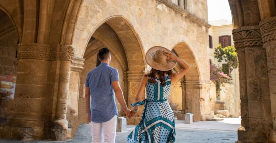 Rhodes: Guided Rhodes City By Night with Live Music & Dinner - Mandraki Harbour and the waterfront feel of Rhodes at sunset