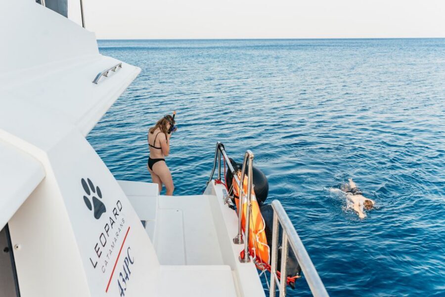 Rhodes: Sunset Catamaran Cruise with Dinner Buffet & Drinks - Kalithea Bay swim and snorkeling: the part that makes the cruise feel like an escape