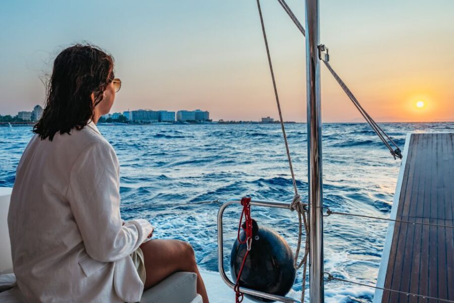 Rhodes: Sunset Catamaran Cruise with Dinner Buffet & Drinks - Drinks and music: the vibe without the pressure