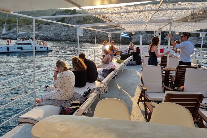 Rhodes Sunset Cruise - Swim and Dine w/ Live Music & Sunset! - Price and value at about $58.87 per person
