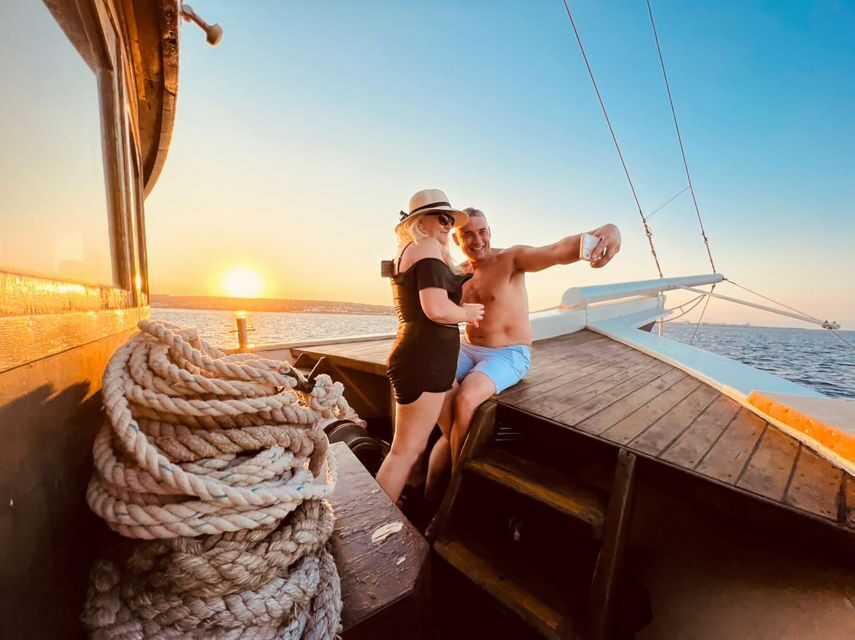 Rhodes: Sunset Cruise with Greek BBQ and Unlimited Drinks - Kallithea Springs Swim Stop: The Main Event