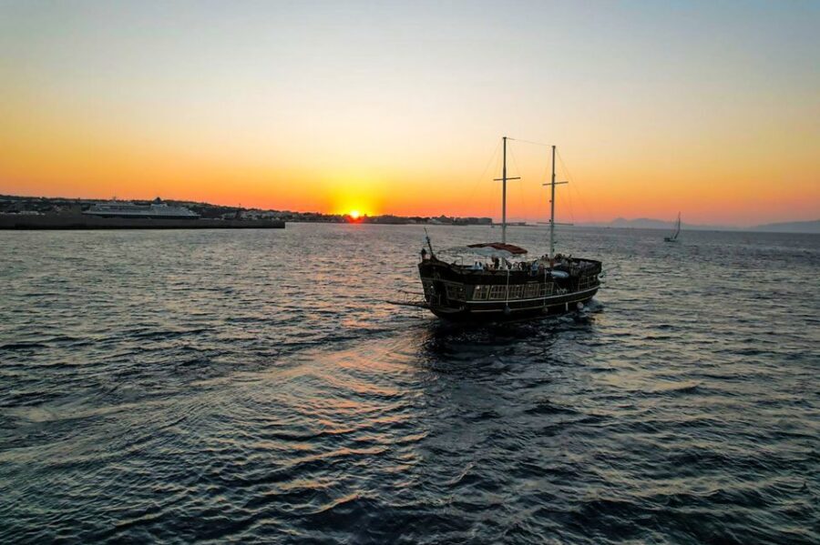 Rhodes: Sunset Cruise with Greek BBQ and Unlimited Drinks - Scenic Sailing Toward Kallithea: What You See Before You Swim