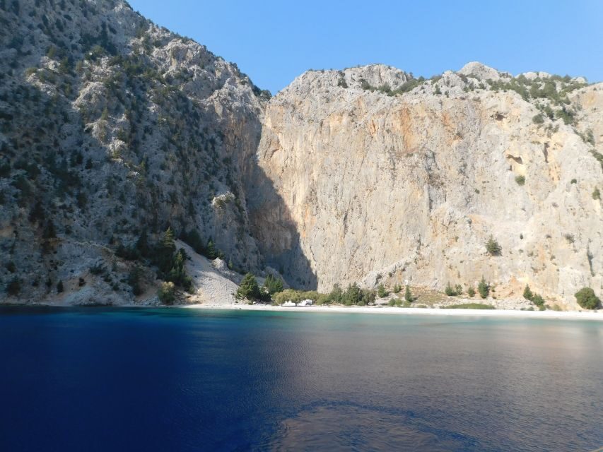 Rhodes Town: Boat Trip to Symi Island and St Marina Bay - Onboard experience with Rizos Cruises: comfort, shade, and a bar for the long ride