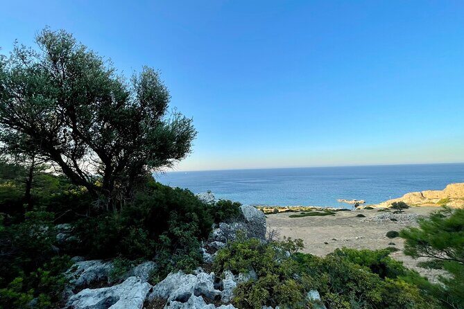 Small group hiking from Pefkos to Navarone Bay at sunrise - Climbing the Navarone Stack Road: Challenge With a Purpose