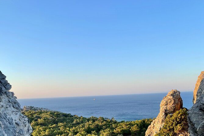 Small group hiking from Pefkos to Navarone Bay at sunrise - The Promontory Walk: Steep Slope, Pine Forest, and Sea Closeness