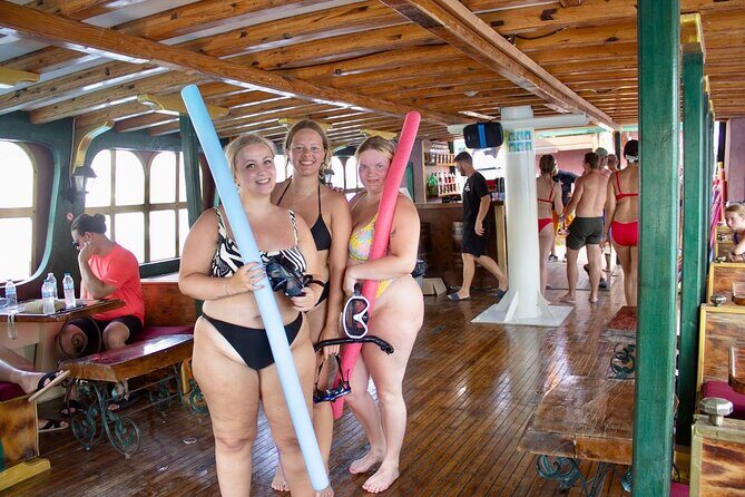 Sun & Sea 6 Hour All Inclusive Swimming Cruise with Greek BBQ & Unlimited Drinks - Traganou Beach caves: swimming in water that feels like a movie set