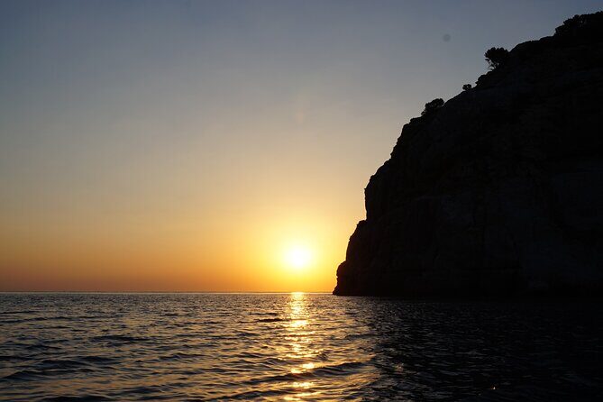 Sunrise Sea Kayaking Experience with Breakfast - Entering the water at Kathara Beach: gear, safety, and the calm first strokes