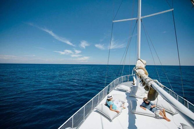 Sunset Cruise with a Swimming Stop at Kalithea Bay - Onboard buffet, drinks, and live music: what the evening feels like