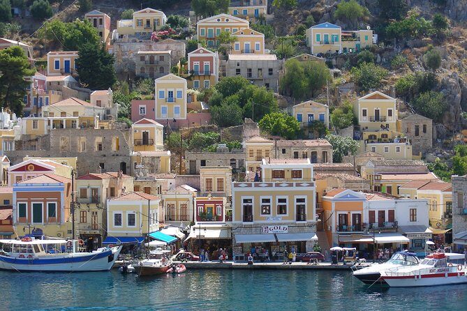 Symi Island Full-Day Boat Trip from Rhodes - Symi morning in Yalos: narrow streets, sponge shops, and the plan for your legs